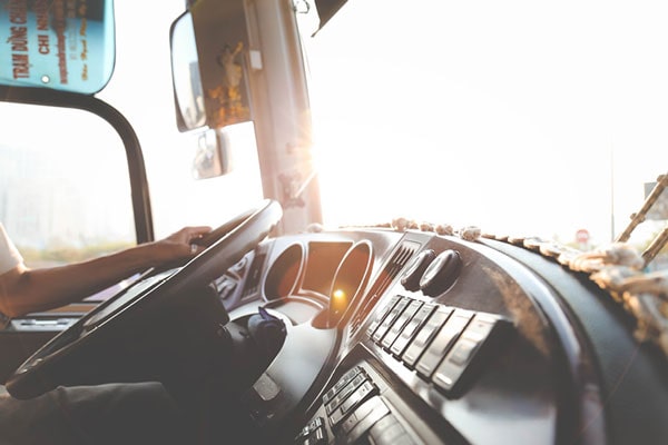 driving the open road view of the cab of an 18 wheel truck