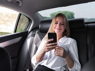 female riding in an uber