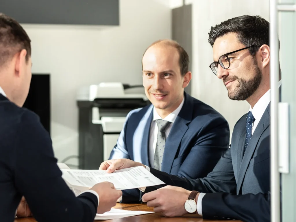 Happy lawyer working with Balanced Bridge funding to bridge the gap of delayed payment